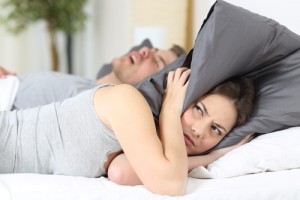 woman mad at man for snoring