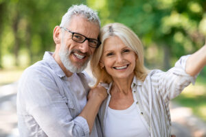 Smiling Couple Dental Implants